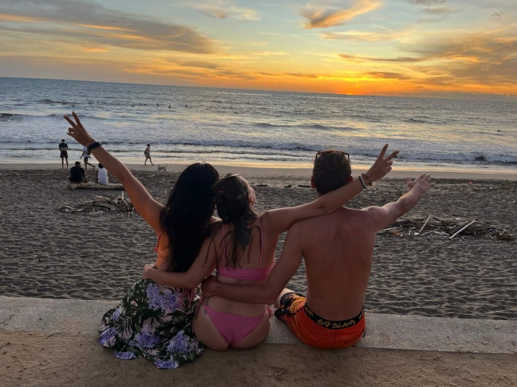 Sunset in Bali from Finns Beach Club with Ellis and Mario from behind