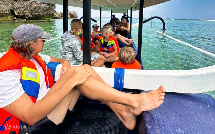 sitting on a goboat from canggu to uluwatu